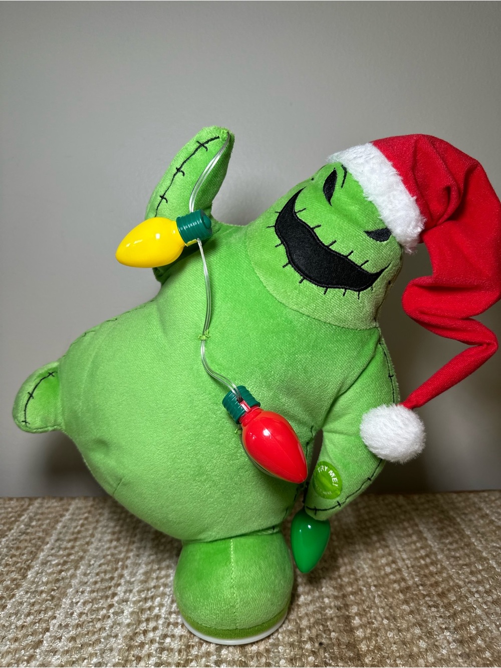 Green Holiday Monster Plush with Red Santa Hat